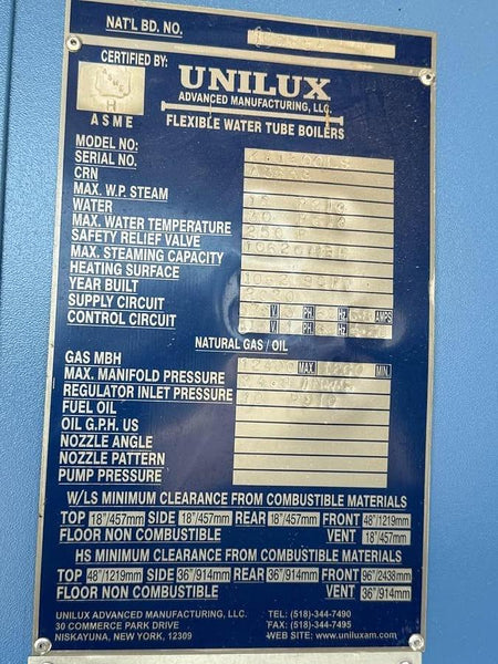 Blue sign with technical specifications of UNILUX boilers on a blue background