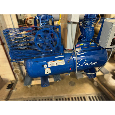 Quincy BMQT7QCBDT dual reciprocating air compressor system with Climate Control, blue horizontal tank, dual pump heads, and digital control panel, 2014