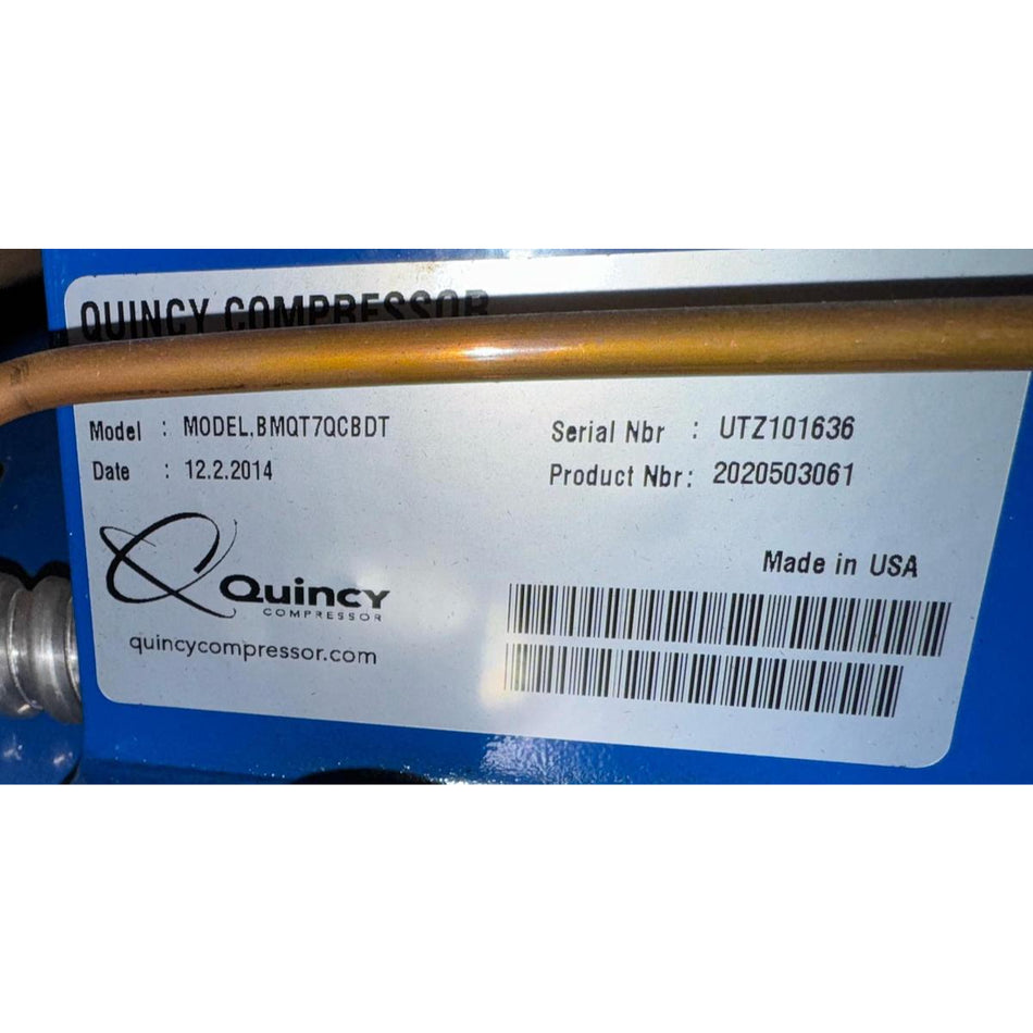 Quincy Compressor BMQT7QCBDT nameplate showing model, serial number UTZ101636, product number 2020503061, date 12.2.2014, Made in USA