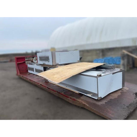 Spring Air KES-ISH commercial kitchen exhaust hood sections disassembled and palletized on flatbed for transport and relocation